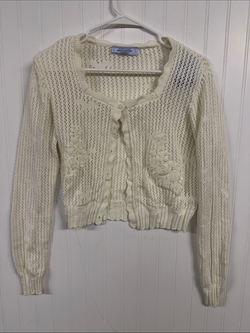 Celebrity Pink Cream Openwork Crochet Cardigan